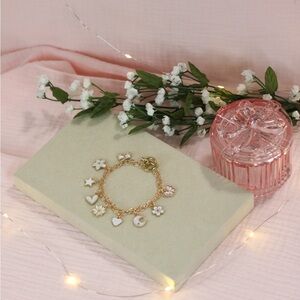 Gold Charm Bracelet with White Accents